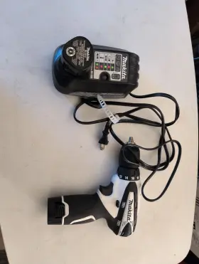 Fd02 Makita Drill With Charger And 2x Batteries