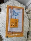 New Fiskars Surecut Titanium Trimmer #154460 10 Sheet Maximum 9". Price: $35.99.
