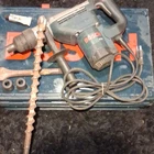 Bosch 11247 1" Corded Rotary Hammer Drill W/ Side Handle, Case & Bit Used. Price: $154.99.
