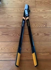 New Garden Trimming Tool - Fiskars 32" Power Gear Bypass Loppers Yard Trees. Price: $85.99.